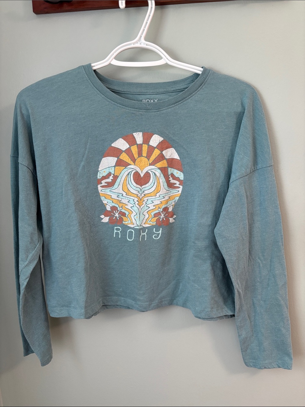 Roxy Teal Long-Sleeve Crop Top with Retro Sun Graphic
